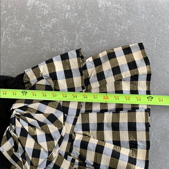 Chic Black and Gold Midi Dress with Elegant Design - Picture 16 of 16